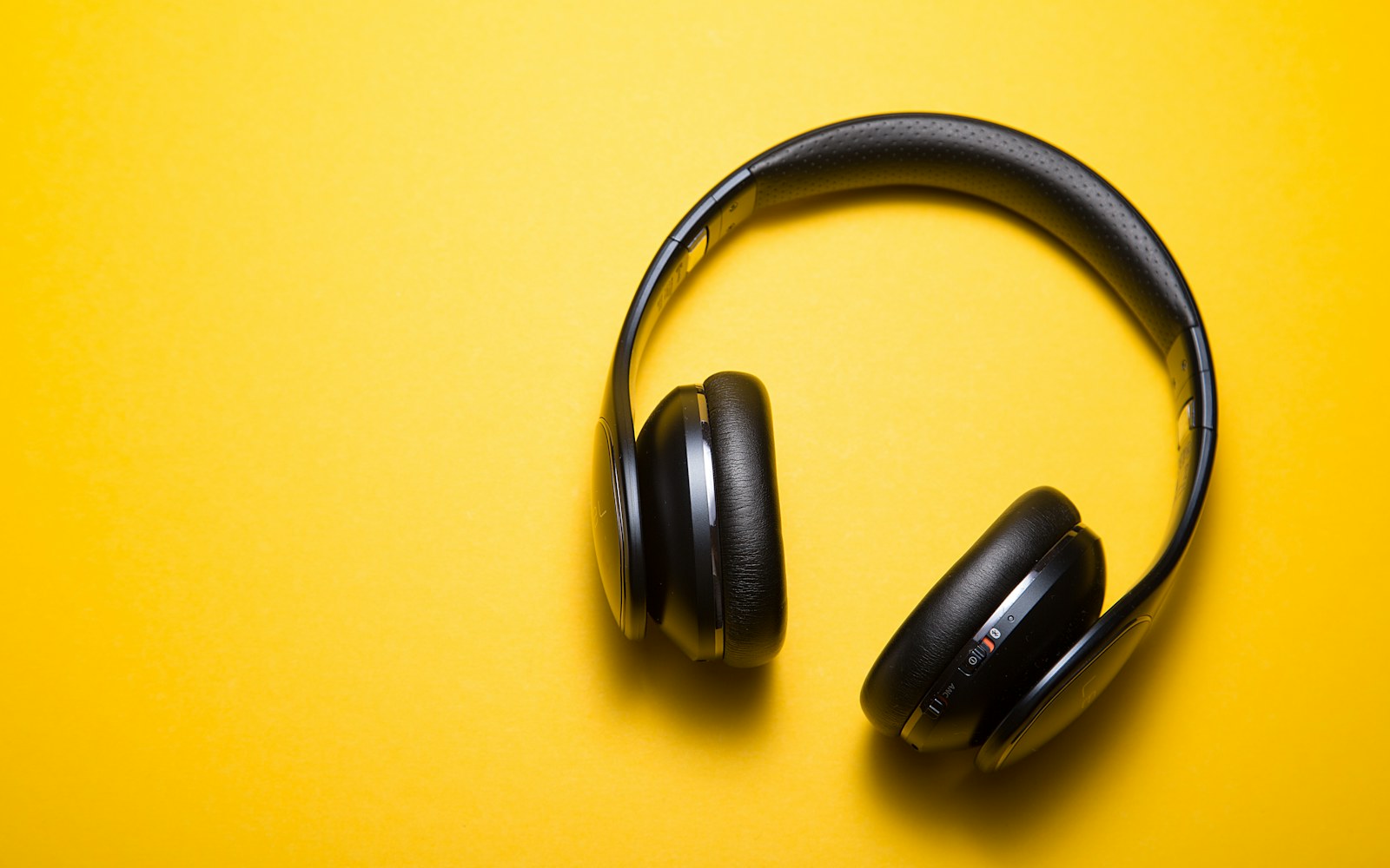A home producer who edits podcasts and occasionally records voiceover; editorial scene